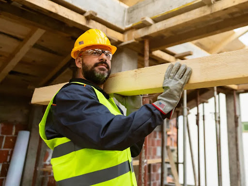 Construction worker reviewing materials